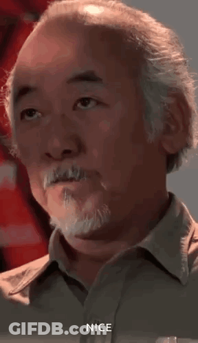 A Close Up Of A Man With A Beard And Mustache Making A Face . GIF