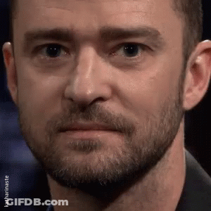 A Close Up Of A Man With A Beard And Mustache Making A Funny Face . GIF