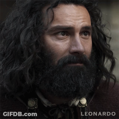 A Close Up Of A Man With A Beard And The Name Leonardo On The Bottom GIF