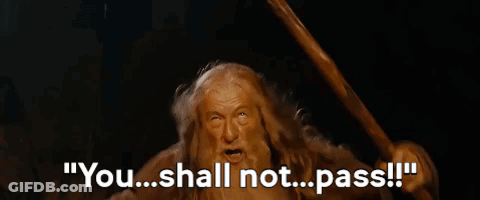 A Close Up Of A Man With A Beard And The Words `` You Shall Not Pass ! '' GIF
