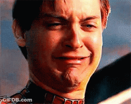 A Close Up Of A Man With A Beard Making A Sad Face GIF