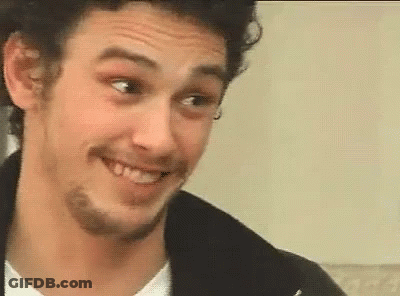 A Close Up Of A Man With A Beard Smiling GIF