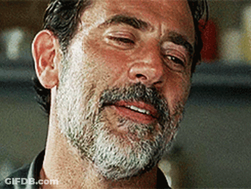 A Close Up Of A Man With A Beard Smiling GIF