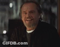 A Close Up Of A Man With A Beard Smiling And Looking At The Camera . GIF