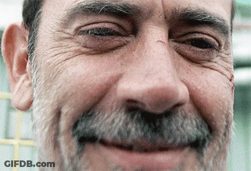 A Close Up Of A Man With A Beard Smiling GIF