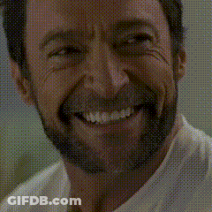 A Close Up Of A Man With A Beard Smiling GIF