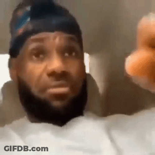 A Close Up Of A Man With A Beard Wearing A Hat And Giving A Thumbs Up . GIF