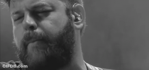 Close Up Of Bearded Man With Earbuds GIF