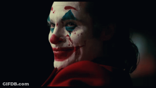 A Close Up Of A Man With A Bloody Face GIF