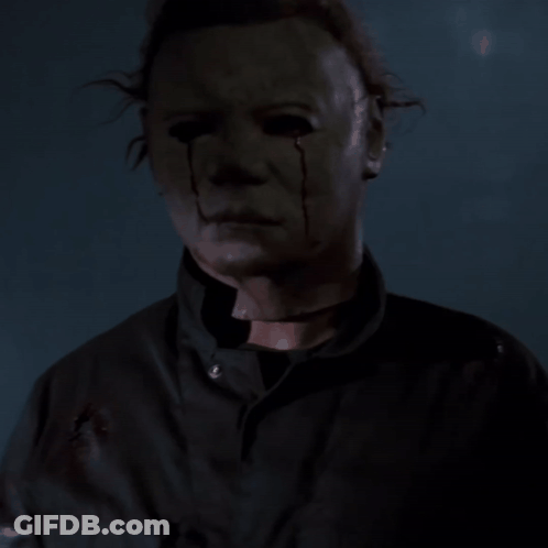 A Close Up Of A Man With A Bloody Face GIF