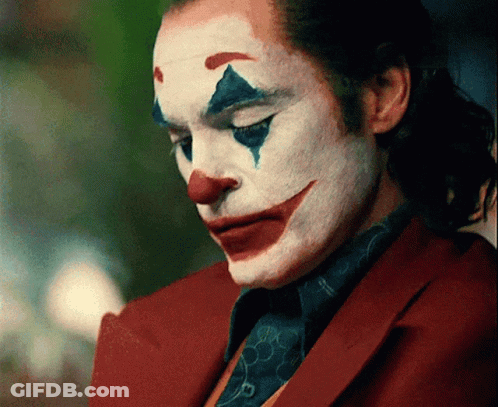 Close-Up Of Man With Clown Face Paint GIF