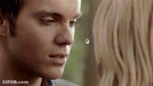 A Close Up Of A Man With A Drop Of Water On His Nose GIF