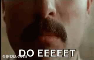 A Close Up Of A Man With A Mustache Saying `` Do Eeeet '' . GIF