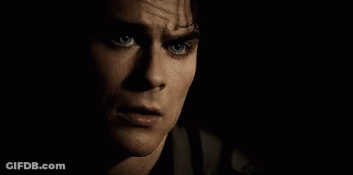 A Close Up Of A Man With Blue Eyes GIF