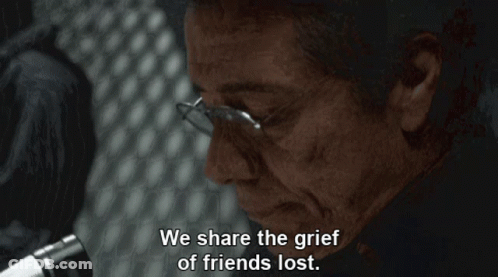 Man With Glasses Saying We Share The Grief GIF