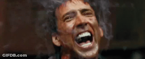 A Close Up Of A Man With His Mouth Open GIF