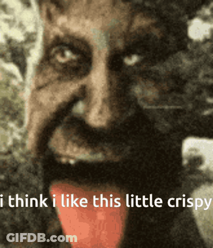 A Close Up Of A Man With His Tongue Out And The Words " I Think I Like This Little Crispy " GIF