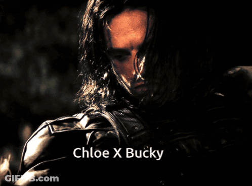 A Close Up Of A Man With Long Hair And The Name Chloe X Bucky GIF