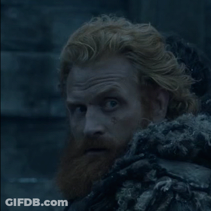 A Close Up Of A Man With Red Hair And Beard GIF