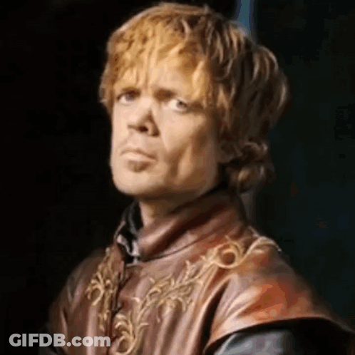 A Close Up Of A Man With Red Hair Wearing A Leather Vest And Making A Funny Face . GIF