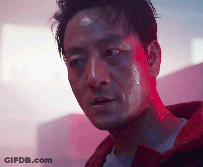 A Close Up Of A Man With Sweat On His Face GIF