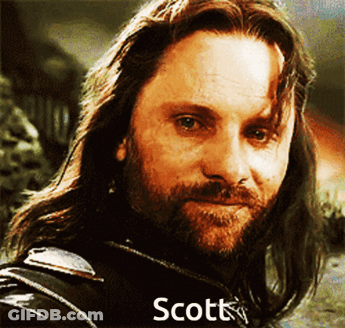 A Close Up Of A Man With The Name Scott On The Bottom GIF