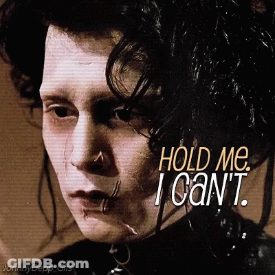 A Close Up Of A Man With The Words Hold Me I Can 'T GIF