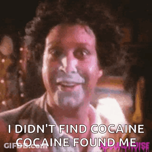 A Close Up Of A Man With The Words " I Did N't Find Cocaine Cocaine Found Me " On The Bottom GIF