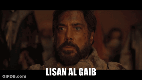 A Close Up Of A Man With The Words Lisan Al Gaib Written Above Him GIF