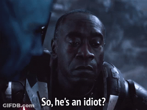 A Close Up Of A Man With The Words So He 'S An Idiot GIF