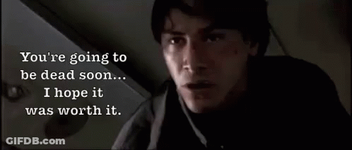 A Close Up Of A Man With The Words You 'Re Going To Be Dead Soon ... I Hope It Was Worth It . GIF