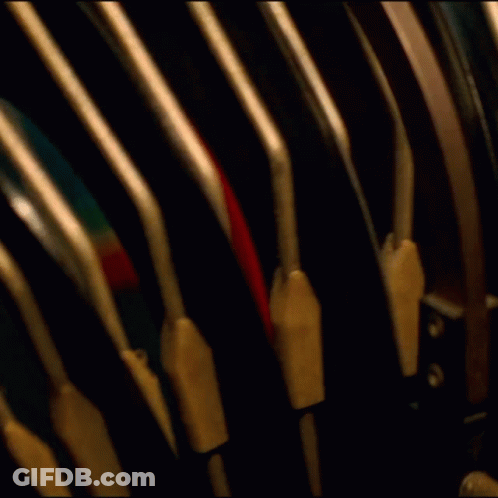 A Close Up Of A Mechanical Device With The Number 1 On The Bottom GIF
