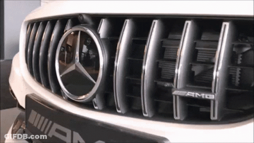A Close Up Of A Mercedes Amg Grille GIF