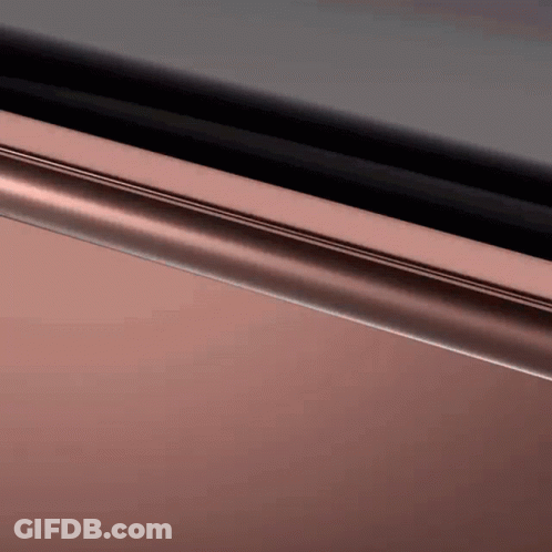 A Close Up Of A Metal Object With A Black Background . GIF