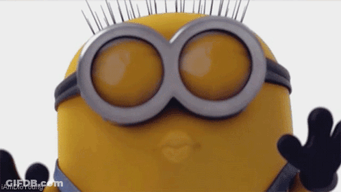 A Close Up Of A Minion 'S Face With The Words I Amdio Young Below It GIF