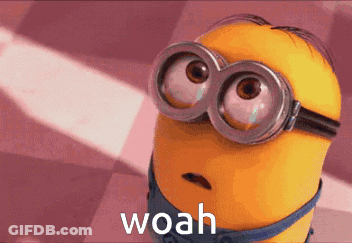 A Close Up Of A Minion Wearing Goggles And The Word Woah GIF