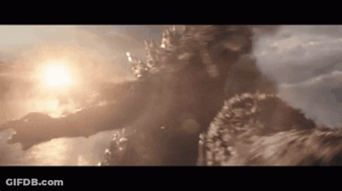 A Close Up Of A Monster Flying Through The Air With The Sun Shining Through The Clouds . GIF