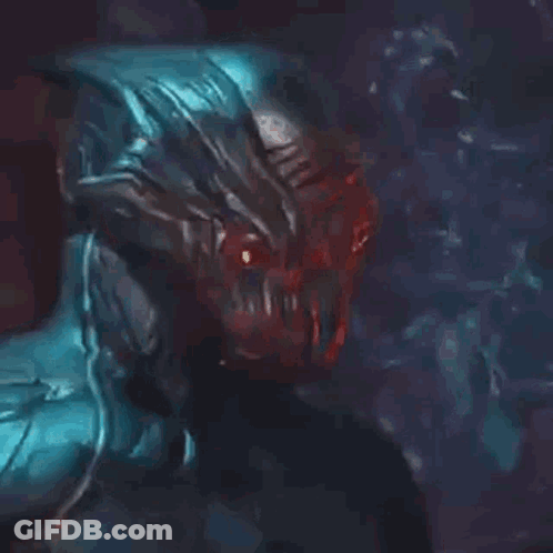 A Close Up Of A Monster In A Video Game With Red Eyes And A Blue Body . GIF