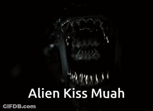 A Close Up Of A Monster Mouth With The Words Alien Kiss Muah Below It GIF