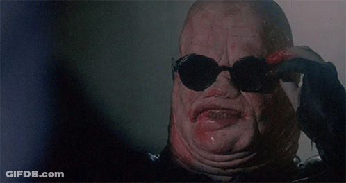 A Close Up Of A Monster 'S Face With Blood On It 'S Mouth GIF