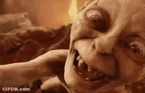 A Close Up Of A Monster 'S Face With Fire In The Background GIF