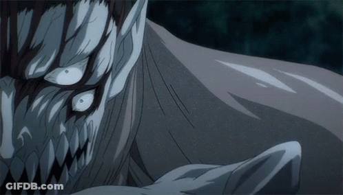 A Close Up Of A Monster 'S Face With Teeth GIF