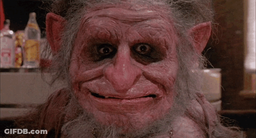 A Close Up Of A Monster With A Green Light On His Nose GIF
