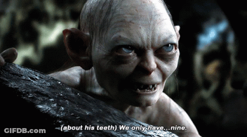 A Close Up Of A Monster With The Words " About His Teeth We Only Have... Nine " GIF