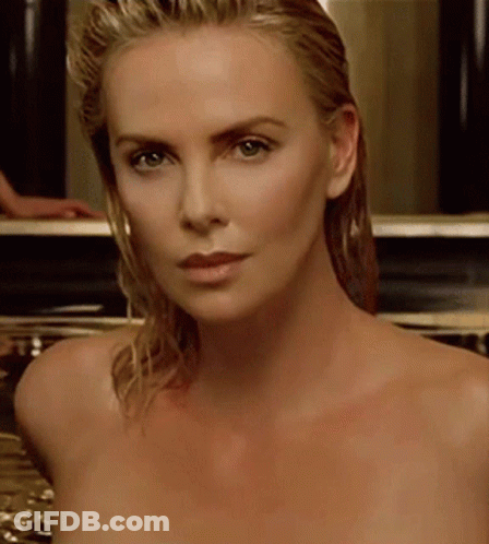 A Close Up Of A Naked Woman 'S Face Looking At The Camera GIF