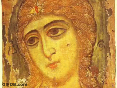 A Close Up Of A Painting Of A Man 'S Face GIF
