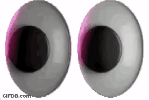 A Close Up Of A Pair Of Cartoon Eyes With A Pink Glow In The Middle . GIF