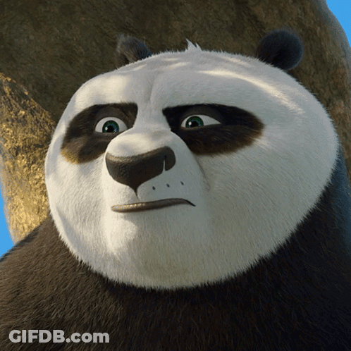A Close Up Of A Panda Bear With A Serious Look On His Face GIF