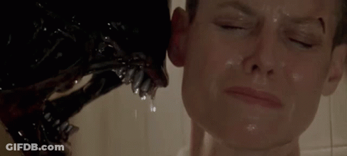 A Close Up Of A Person Being Attacked By A Monster In A Shower . GIF