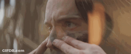 A Close Up Of A Person Cleaning Their Face GIF